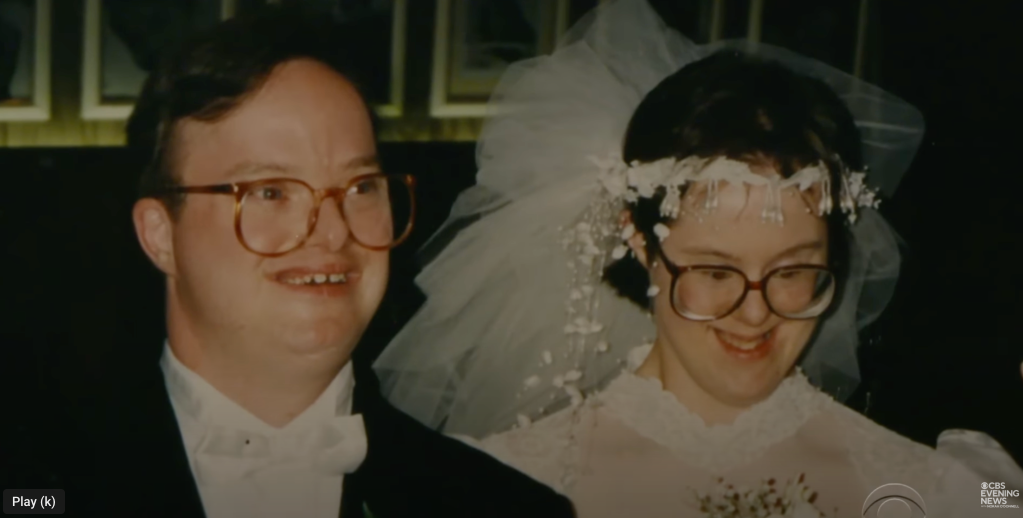 couple with down syndrome on their wedding day.